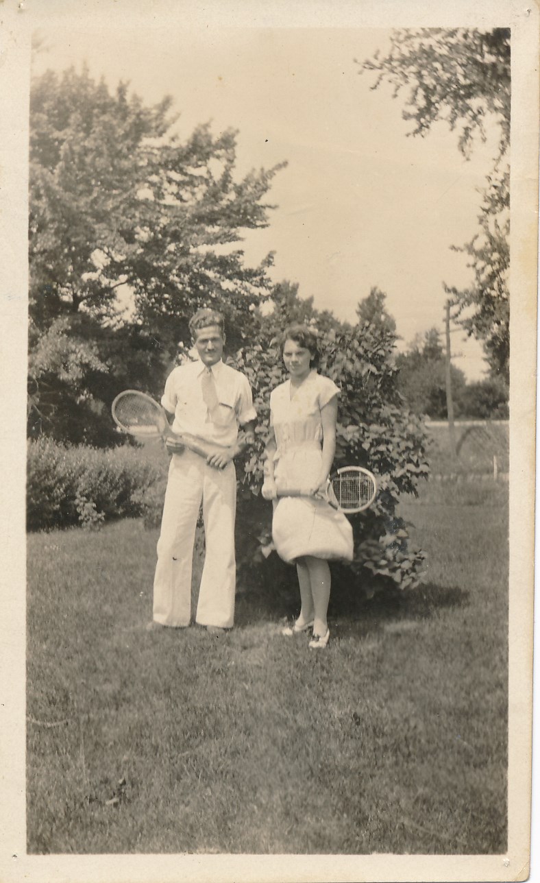 Mom and Dad, with tennis rackets